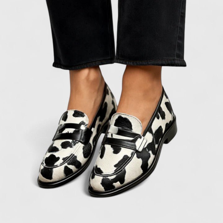 Women's Cow Print Loafers Slip-On Comfort Buckle Detail - Black and White